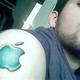 Image for article titled 12 Idiots With Hideous and Stupid Apple Tattoos